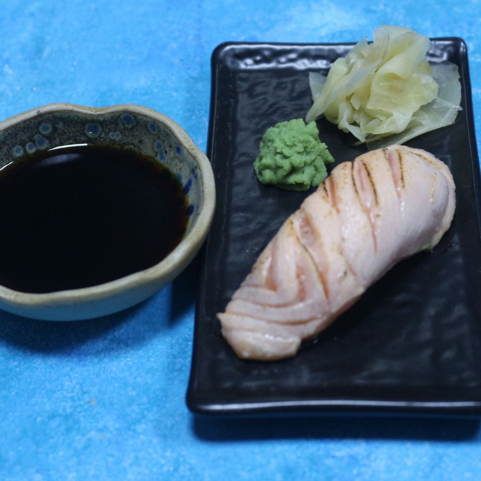 Hot Sake Nigiri (1 pcs.)